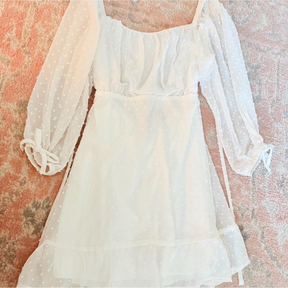 Speechless Dresses & Skirts - White mini dress - sheer polka dot layer - quarter sleeve - tie back